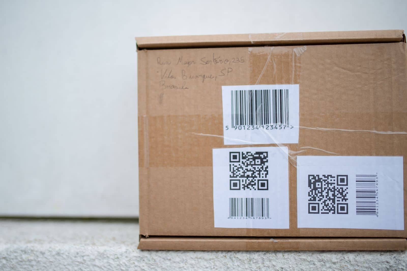A packed carton with its barcode and address labels