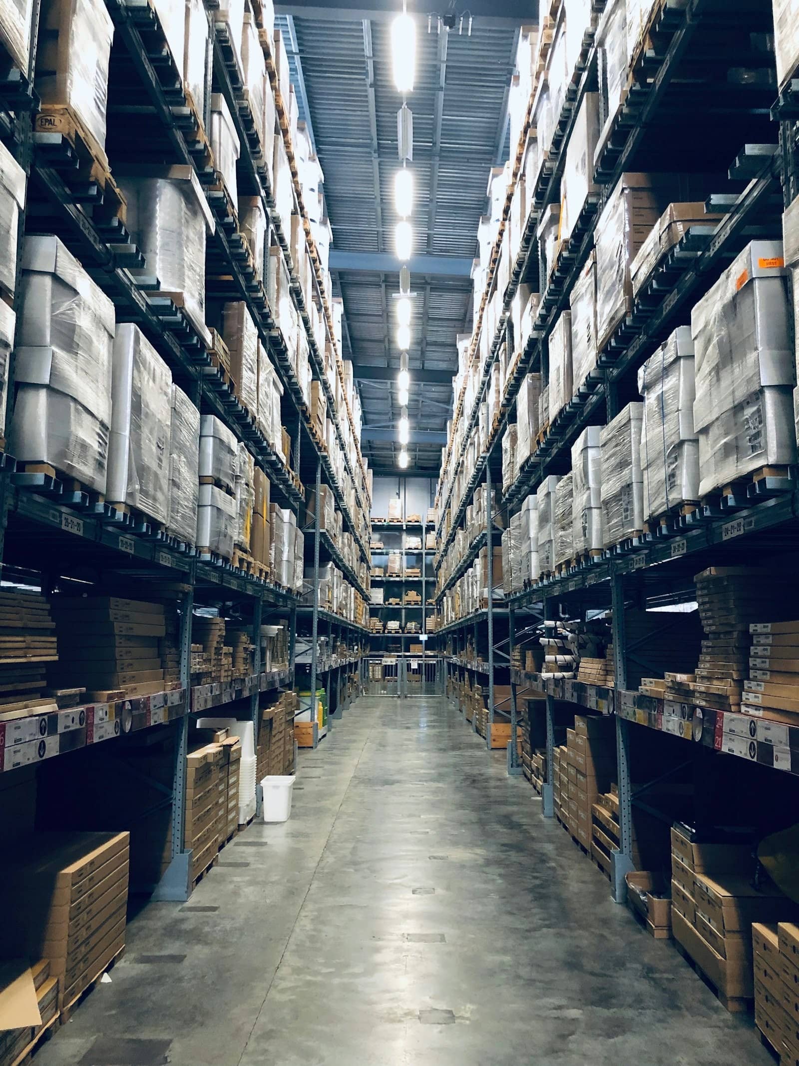 Racked shelves in a Logibuddy warehouse aisle